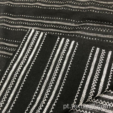 Tecido de tricô com linha preta e branca
